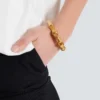 Sync-armband i mässing med bambumönster