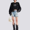 T-shirt med Balmain Paris-tryck