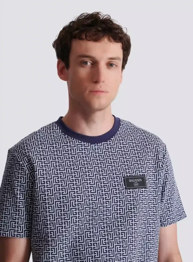 T-shirt med monogram och Balmain Couture-etikett