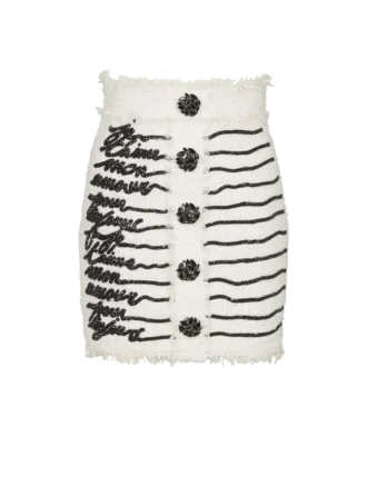 Tweedkjol med broderade kärleksbrev
