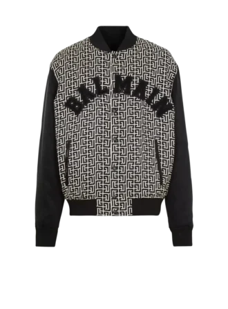 Varsityjacka med monogram och patchar